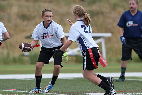 Youth flag football player in the Senior Age Group​