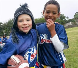 two youth flag football players