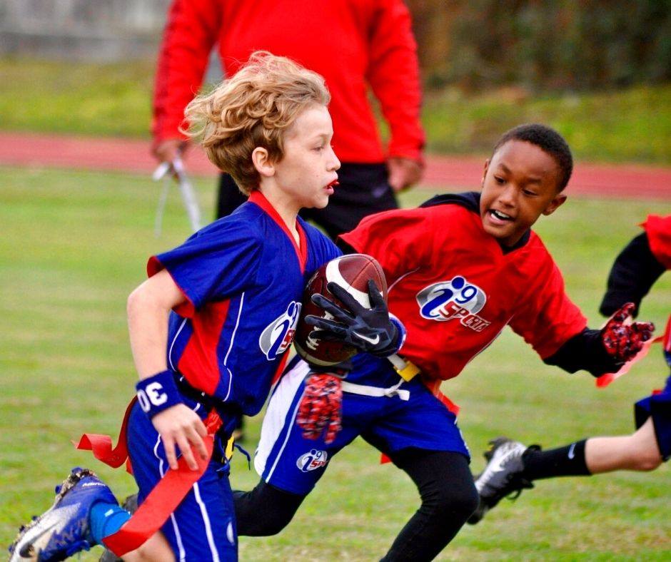 Two i9 Sports Flag Football Players